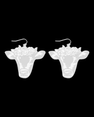 Silver colored die-cut cow earring