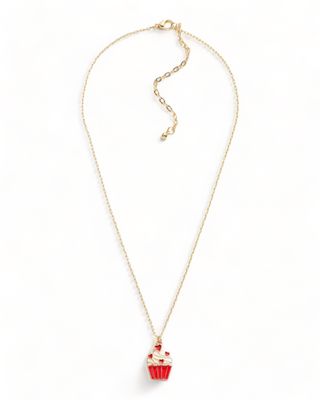 gold colored necklace with a cupcake pendant featuring heart "sprinkles"