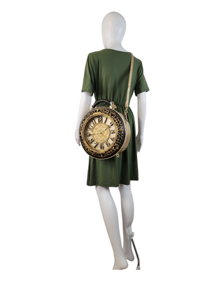 Gold/Black ornate circular shaped handbag/crossbody with working clock face on a mannequin