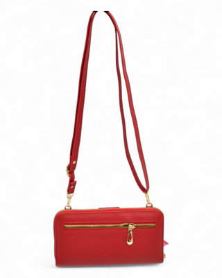 Red crossbody bag with a strap on a white background