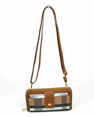 Plaid patterned handbag with brown strap on a white background
