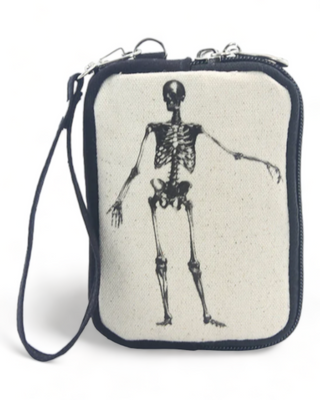 Detailed view of a canvas pouch with a full skeleton print, emphasizing the graphic design and pouch texture