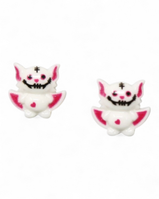 Pair of cat-shaped earrings with pink accents on a white background