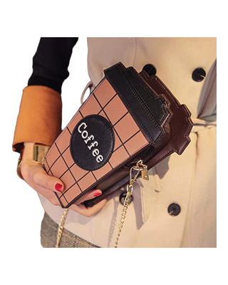 Model holding brown coffee cup shaped handbag
