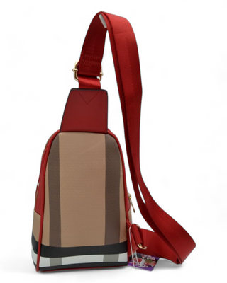 Stylish crossbody bag with gold zipper details and a bee emblem, featuring an adjustable strap and structured design