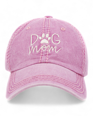 Pink cap with 'Dog Mom' and paw print design on a white background