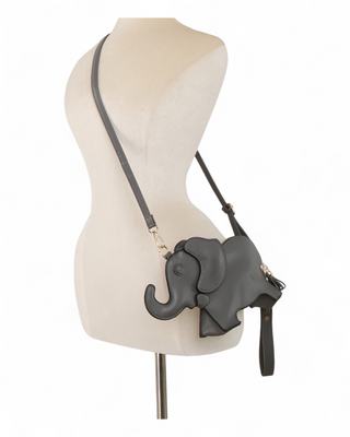 Gray elephant-shaped handbag on a mannequin with a white background