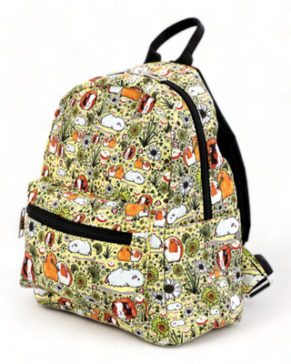 A vibrant yellow backpack featuring a whimsical guinea pig print amidst a pattern of greenery and daisies, with black zippers and straps.