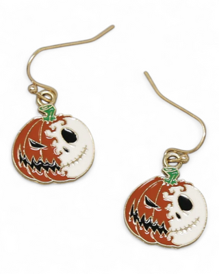 Halloween-themed pumpkin earrings with jack-o'-lantern faces on a white background