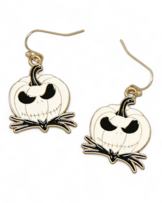 Pumpkin-shaped earrings with black accents on a white background