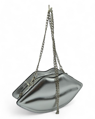 Silver clutch bag with chain strap on a white background