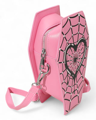 Pink crossbody bag with heart and spider web design on a white background