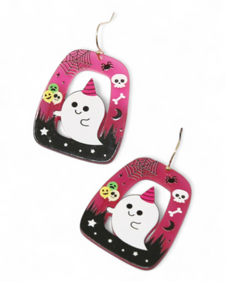 Halloween-themed earrings with ghost designs on a pink background.