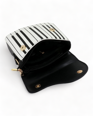 small black and white piano inspired shoulder bag
