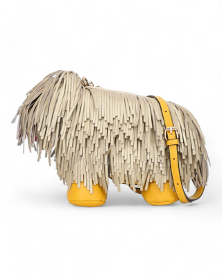 Adorable crossbody bag designed to look like a shaggy dog, featuring a furry exterior, cute facial details, and an adjustable strap, displayed on a clean, white background