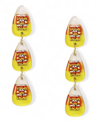 Halloween-themed candy corn earrings with 'Trick or Treat' text on a white background