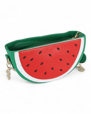 Watermelon-shaped handbag with green rind and red flesh on a white background