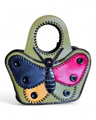 Butterfly-shaped handbag with colorful design on a white background