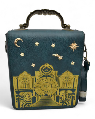 Back of handbag showcasing celestial embroidery along the lower section.