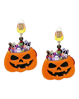 Glittery orange pumpkin earrings topped with a crown of colorful Halloween candies, featuring a candy corn charm labeled 'Trick or Treat' at the top.